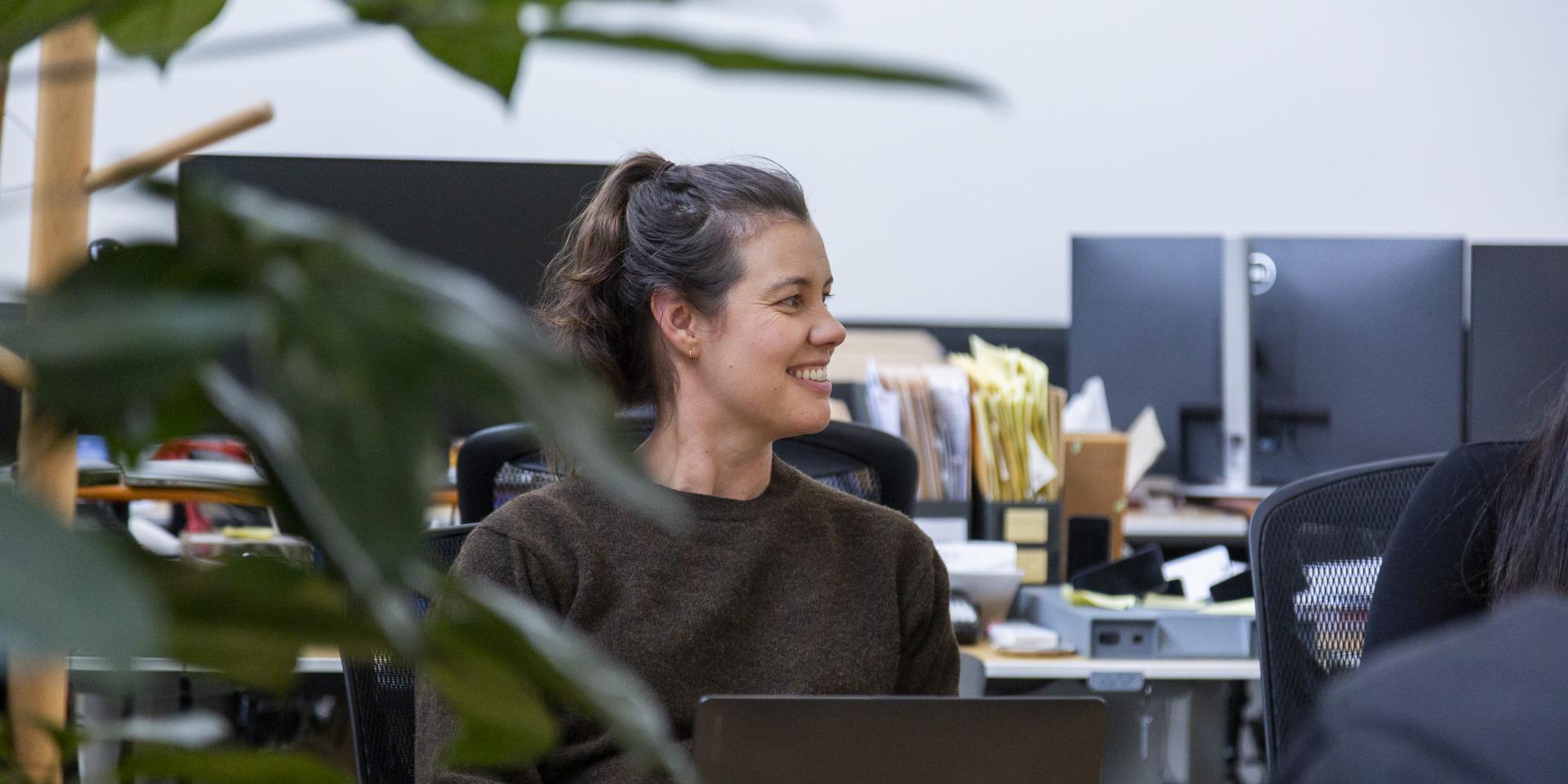 Vanessa sitting at her desk