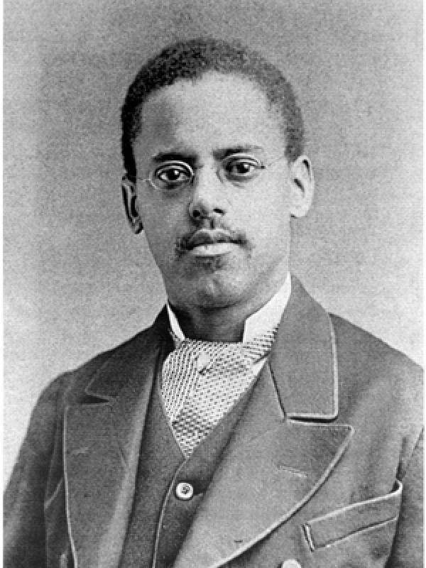 A black and white photo of inventor Lewis Howard Latimer.